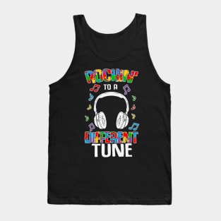 Rocking to a different tune Puzzle piece Autism Awareness Gift for Birthday, Mother's Day, Thanksgiving, Christmas Tank Top